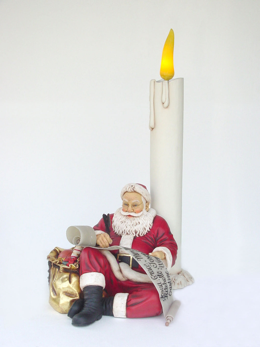SANTA SITTING WITH CANDLE & LIST - JR 2215