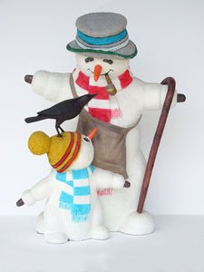 SNOWMAN WITH CHILD AND BIRD JR 1854