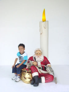 SANTA SITTING WITH CANDLE & LIST - JR 2215